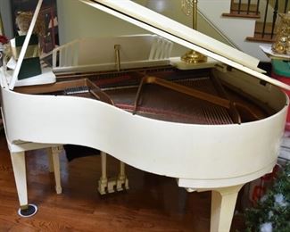 Bardbury, New York, white grand piano and bench, insides replaced a few years ago, tuned up a couple of times in recent years