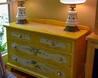 Yellow dresser/chest of drawers, pair of lamps
