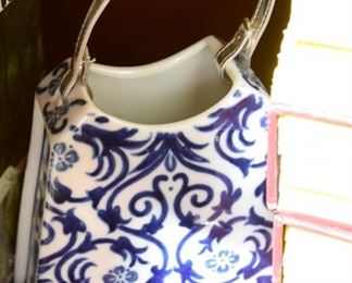 small blue and white ceramic purse