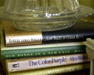 glass covered dish, books