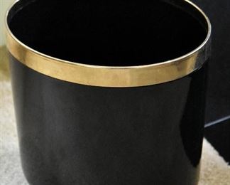 black and gold wastebasket