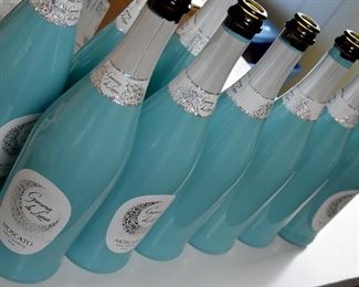 light blue empty moscato bottles