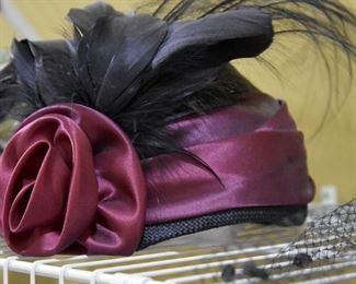 fancy hat with feathers