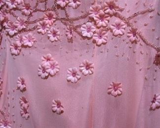 dress with flower and bead embelishments