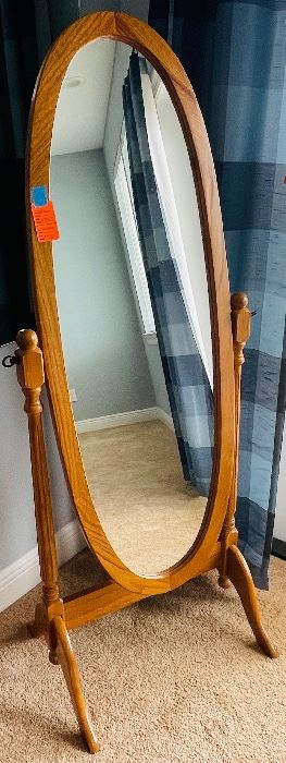 26.   Oak tilting mirror on stand • 61"H x 24"W x 18"D • $75