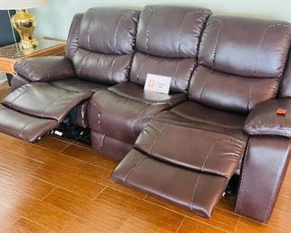 28.   Power reclining sofa • 42"H x 90"W x 38"D • $450