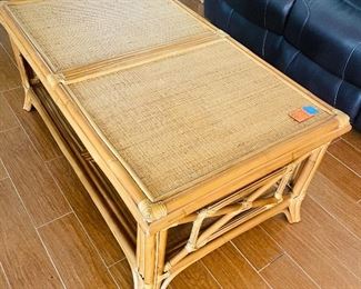 29.   Tropical coffee table • bamboo/rattan • 22"H x 49"W x 29"D • $120