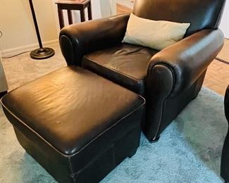 14.    Classic brown chair with ottoman • 34"Hx38"Wx40"D • $195