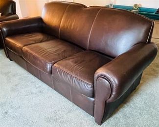 15.   Classic brown sofa • 34"Hx85"Wx40"D • $275