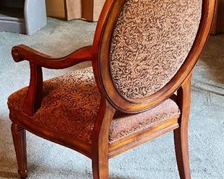 16.    Oval back arm chair • 41"Hx24"Wx22"D • $100
