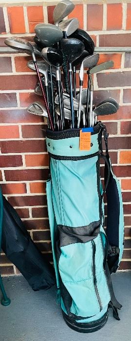40.  Golf bag with several clubs • $50