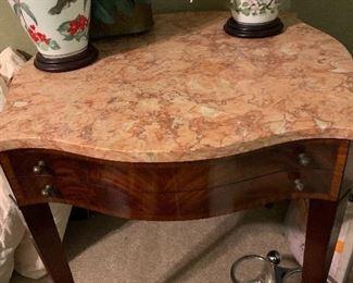 Rose marble topped stand