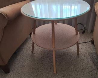 24 inch round particle board with 2 table cloths