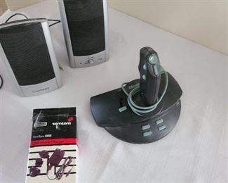 Microsoft joystick and Tom Tom charger and computer speakers