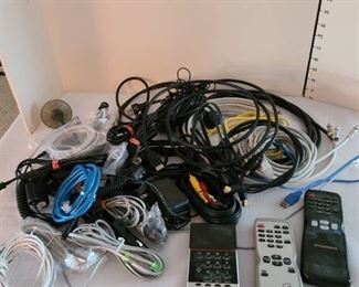 Various cords, chargers and remotes