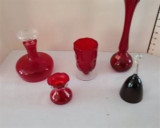 Assorted red glass and bell
