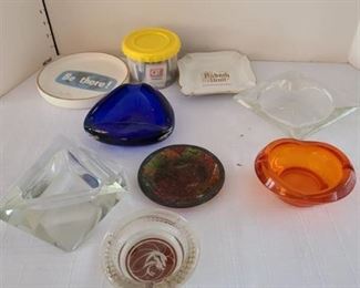 Assorted ashtrays and matches