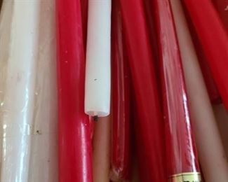 Assorted red and white taper candles