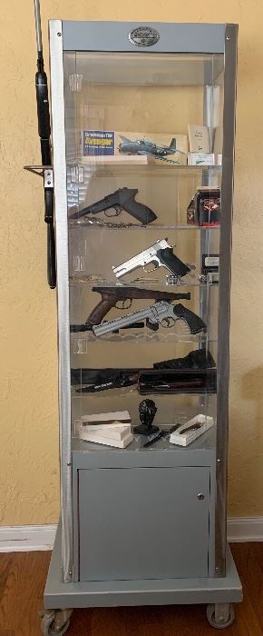 Fossil industrial style display cabinet with locks, BB guns. No one under the age of 18 may purchase a BB gun: we will ask for ID. 