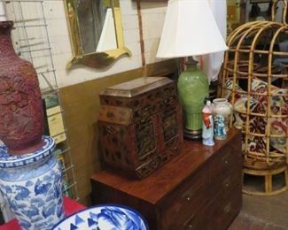 One of several beautiful Asian chests and a Henredon campaign style chest of drawers