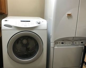 Maytag Neptune front loading washer and dryer with specialty drying compartment