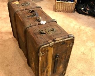 Old steamer suitcase with Luggage labels still attached. 