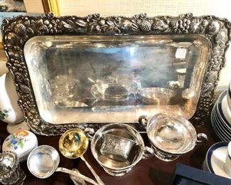 Sterling tray and ladles.