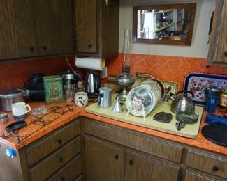 collector plates, household items, small pressure cookers
