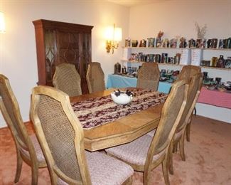 dining table with 2 leaves, 8 chairs. china cabinet