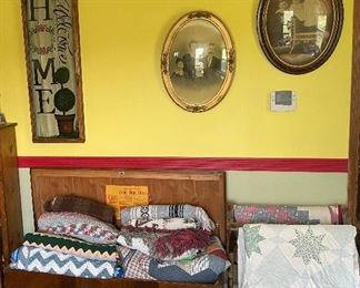 Quilt rack and antique family photos