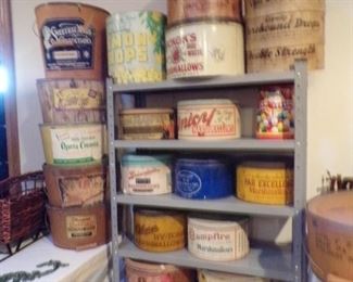 tins, some cardboard round containers