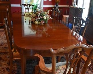 Gorgeous Dining Room Table and 8 Matching Chairs with Beautiful Needle Point Chairs in Chippendale Style.