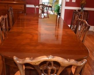 Gorgeous Dining Room Table and 8 Matching Chairs with Beautiful Needle Point Chairs in Chippendale Style.