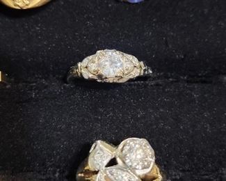 Center Ring is 14k White Gold with a 1/2 carat Diamond in center I1-SI2 and F in color