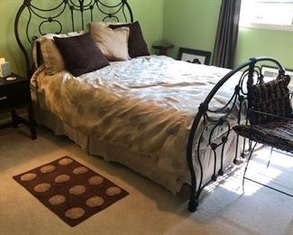 Queen wrought-iron bed