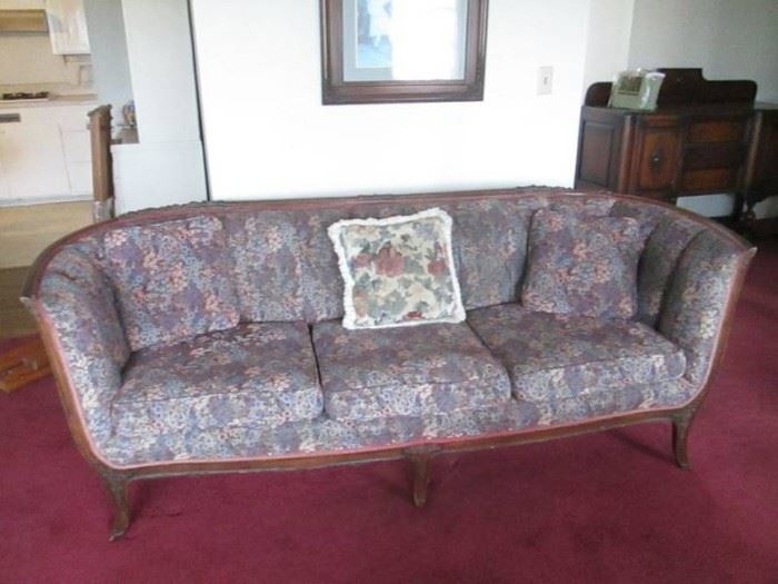 Vintage Ornate Upholstered Sofa with Decorative Throw Pillows