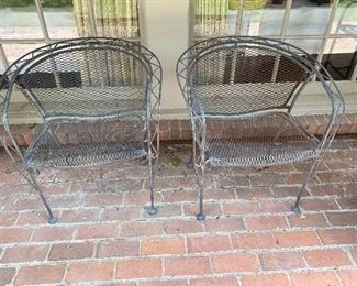 pair of iron patio chairs