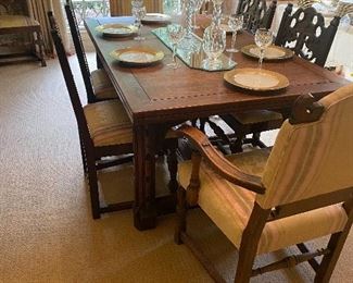 English oak draw leaf dining table with 8 chairs, 2 arm and 6 side