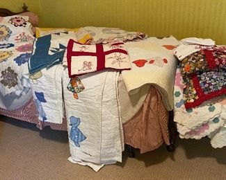 collection of handmade quilts, including fabulous pair of handmade yo-yo quilts