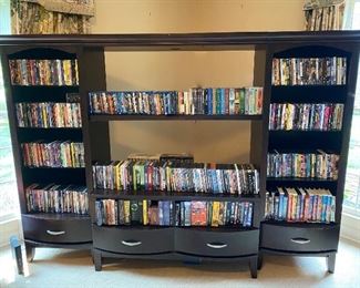 Large entertainment center. LOTS of DVDs, CDs, Blu-ray, vhs tapes