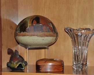 Ceramic, Woodwork and Crystal. The Ceramic Dome is by Alan Viglan.