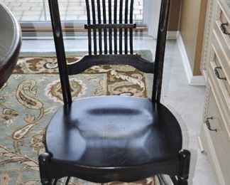 One of the Great Antique Distressed Black Sheaf Back Dining Chairs which are part of the Antique Dining Set