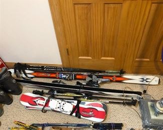 Large quantity of sporting goods to include snowboards, skis, diving equipment, golf clubs, exercise etc