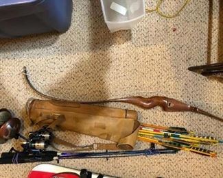 Sporting goods to include bow and arrow set with quiver and fishing poles