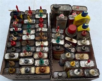 Numerous Old Oil Cans