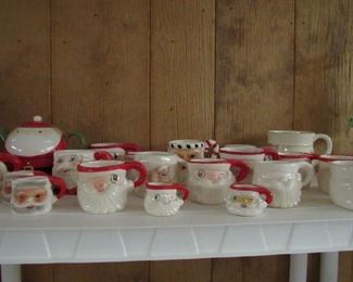 Lots of cups including many old Holt Howard pieces