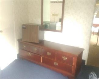 Lots of colonial style furniture including low dressers, headboards etc