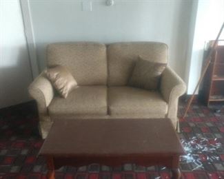 Nice love seat and colonial coffee table