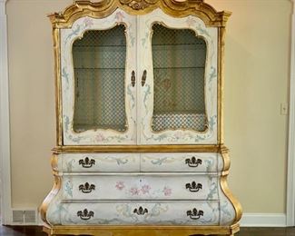 Dramatic hand painted bombe cabinet