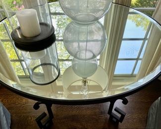 $750.00 Pomeii iron and mirror table 29 1/2"h x 42" diameter